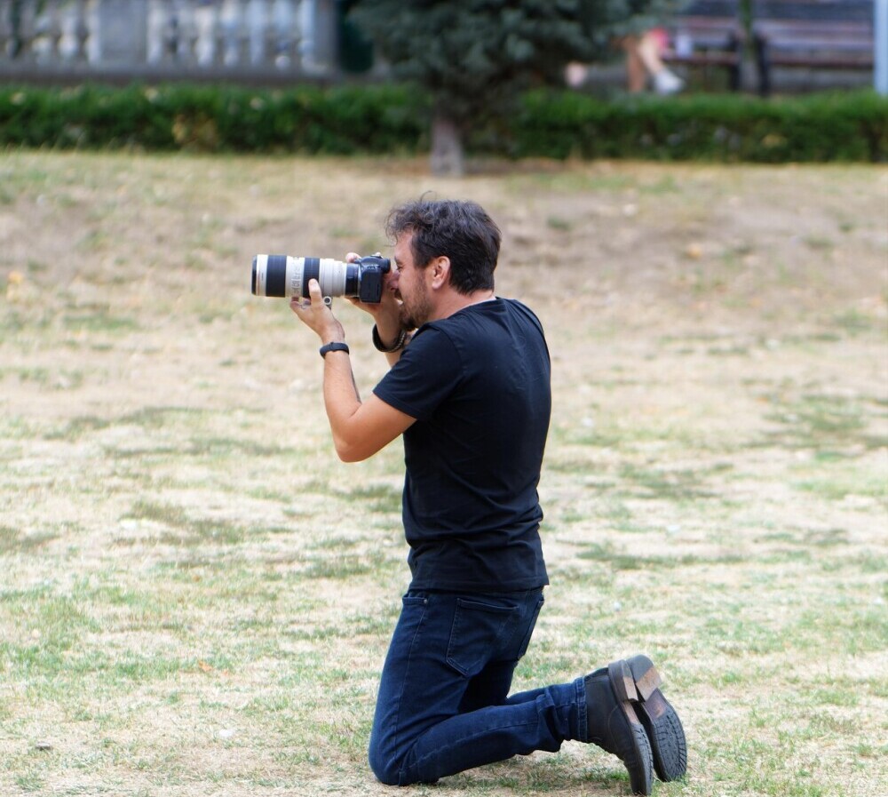 man photographing